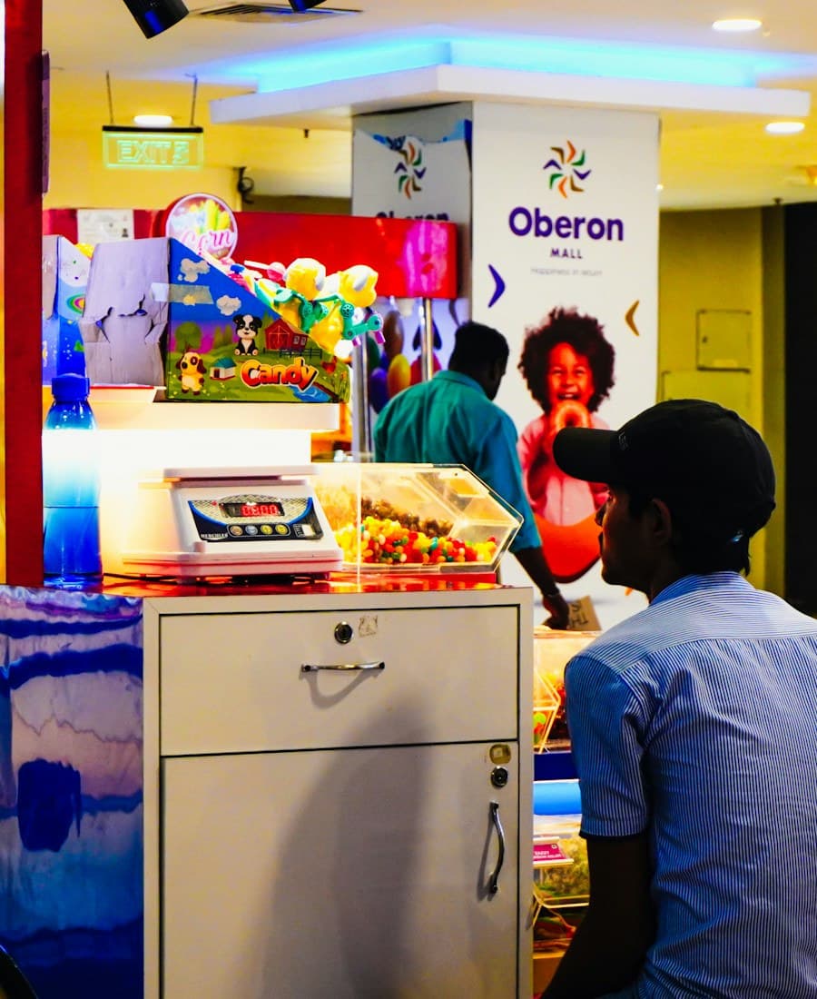 Customers at a brightly lit retail payment point